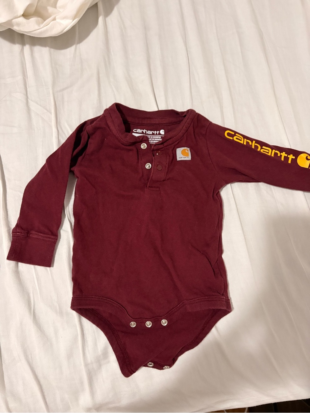 Carhartt Toddler Long-Sleeve One-Piece Bodysuit in Burgundy with Yellow Logo